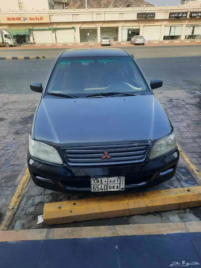 لانسر متسوبيشي 2003 لون رساسي غامق 1