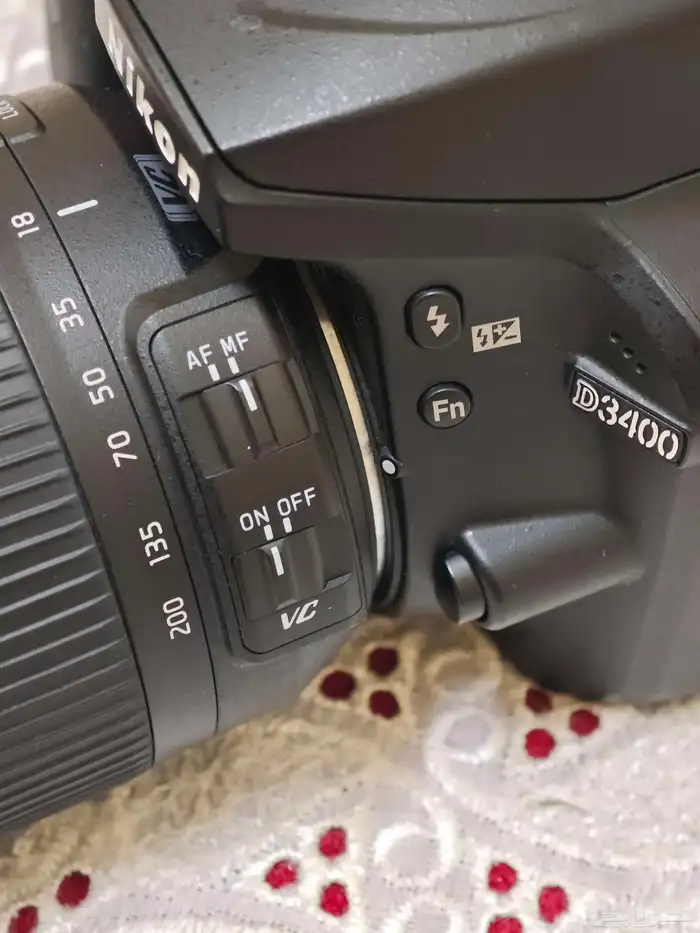 كاميرا نيكون D3400 مع عدسه تامرون 14
