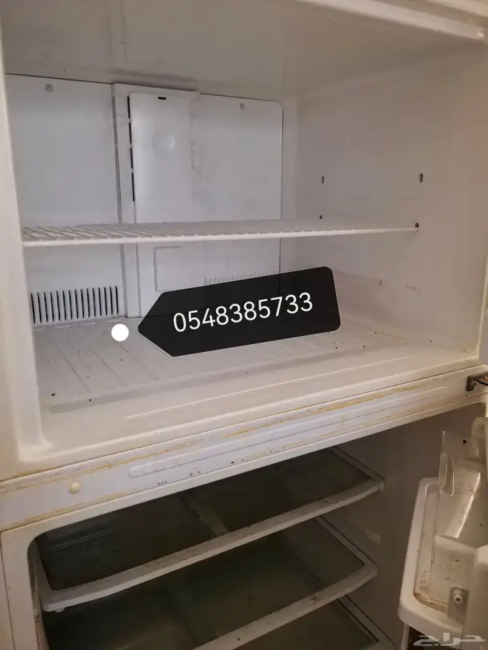 ثلاجة وجهاز رياضي وطاوله 2