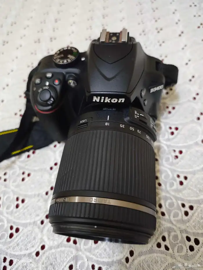 كاميرا نيكون D3400 مع عدسه تامرون 1