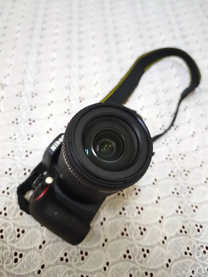 كاميرا نيكون D3400 مع عدسه تامرون 4
