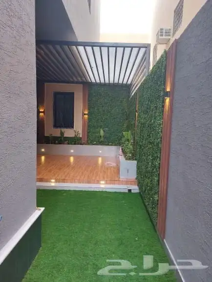 تنسيق حدائق الرياض وزراعة الثيل الطبيعي وتركيب العشب الصناعي 5