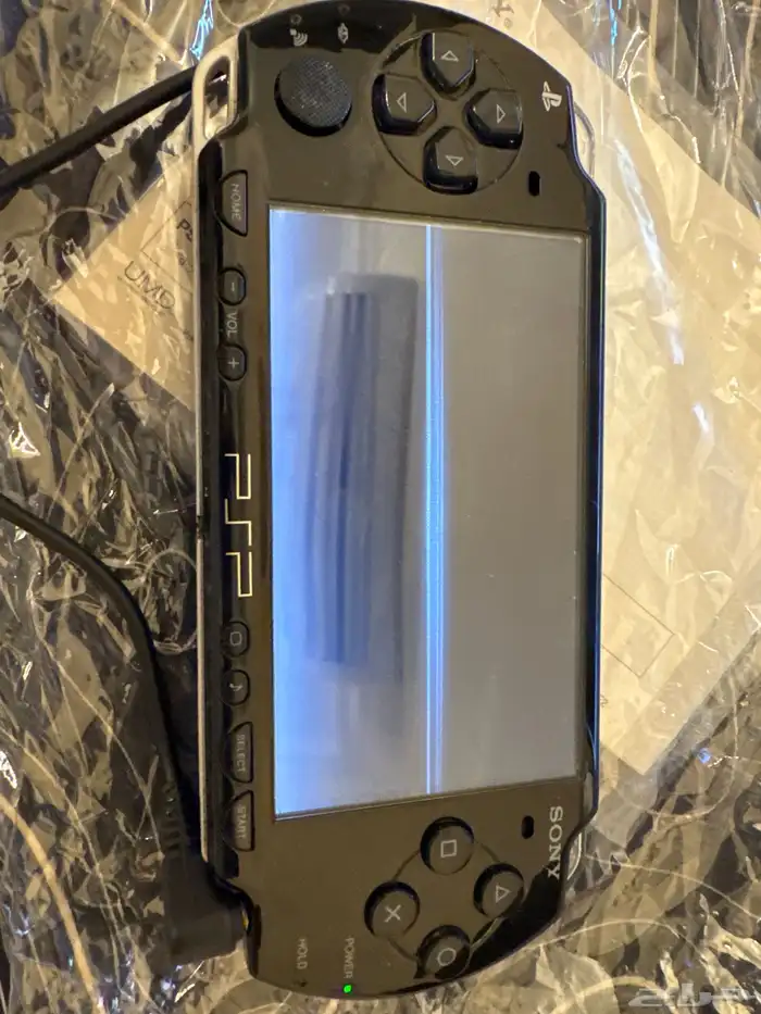 سوني محمول بي اس بي مع كرتونه psp 2000 3
