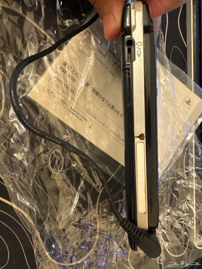 سوني محمول بي اس بي مع كرتونه psp 2000 4