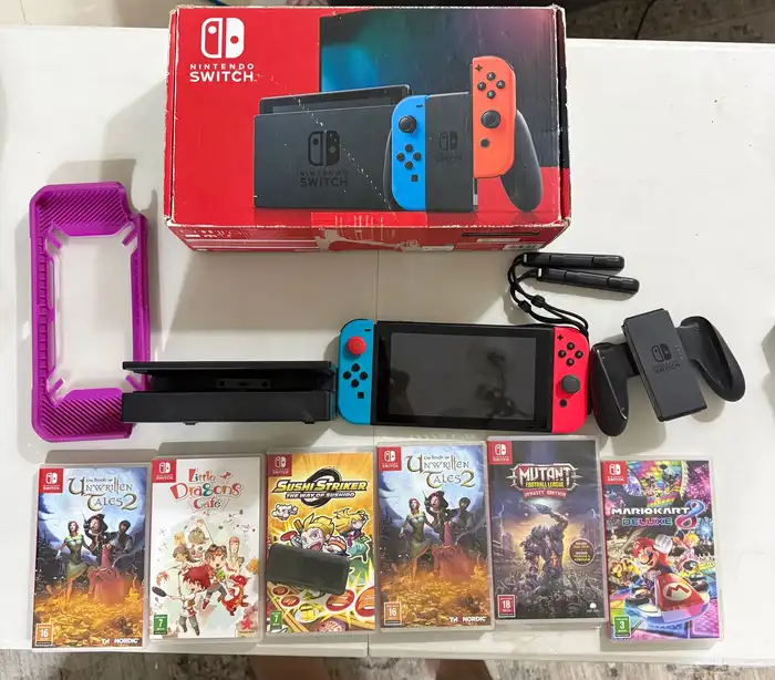 نينتيندو سويتش مع مجموعة العاب استخدام شهرين Nintendo s 0