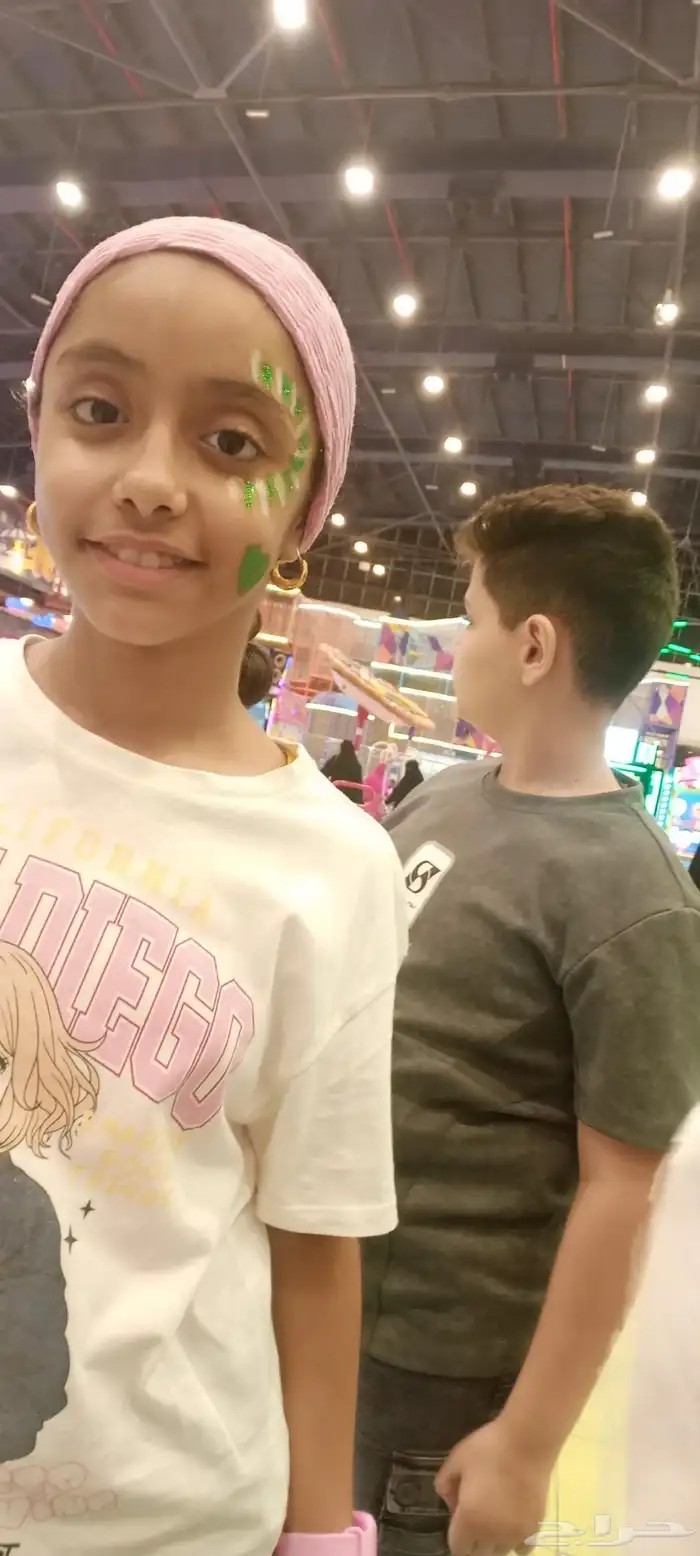 رسم الفرحه علي وجه الاطفال 0