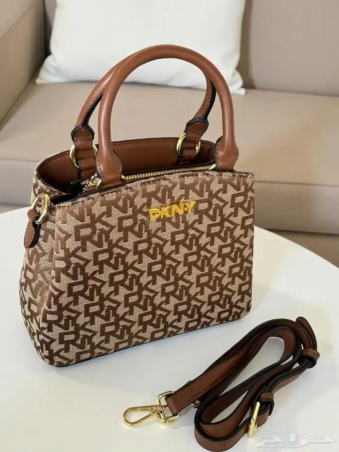 متجر_كاتشي شنطة نسائية من دكني بلون المشمش جلد 2