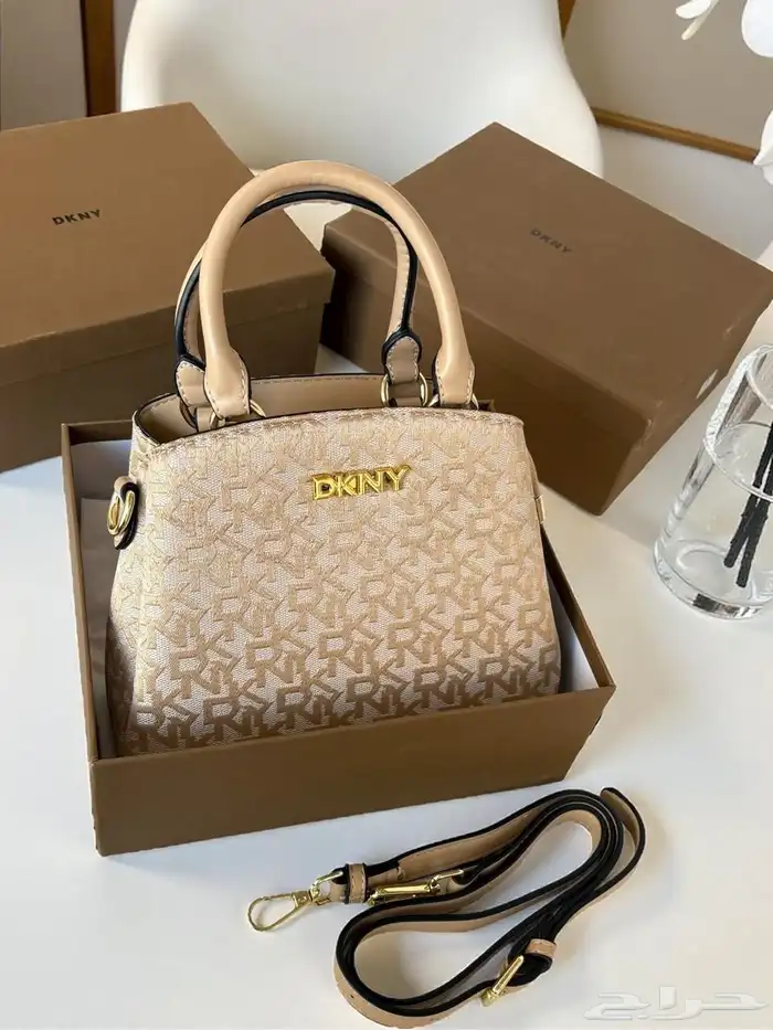 متجر_كاتشي شنطة نسائية من دكني بلون المشمش جلد 1