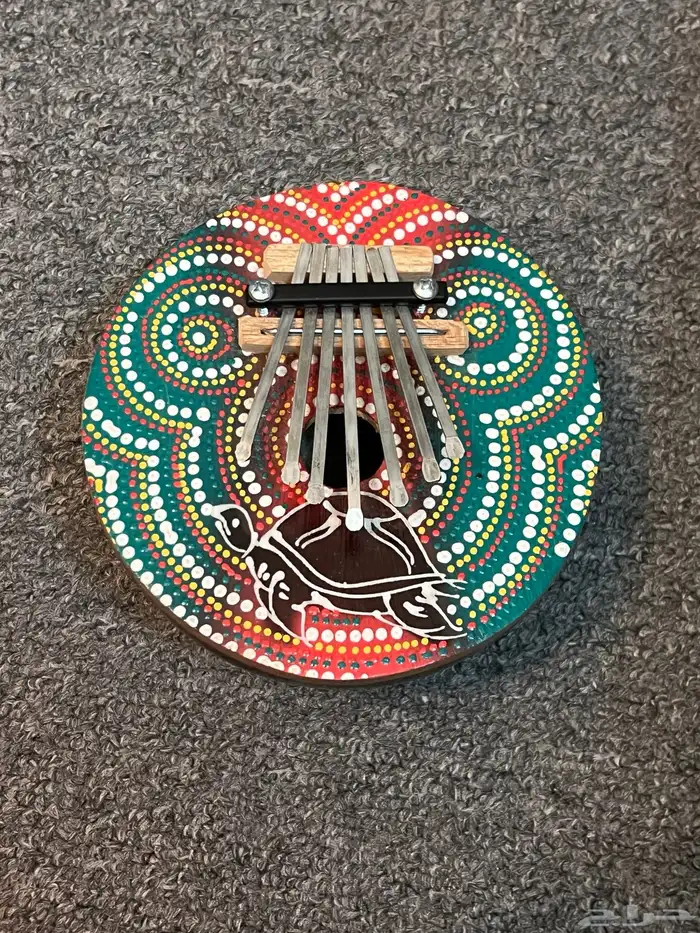 آلتين موسيقية تحفة عمل يدوي من جوز الهند 0