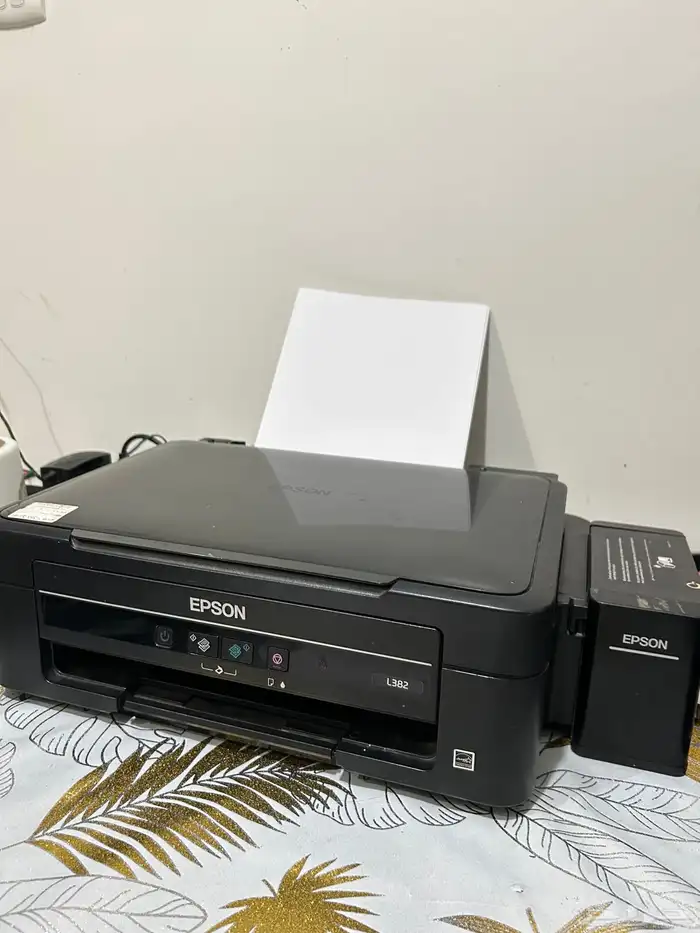للبيع طابعة EPSON L382 مستعملة مع حبرها 0