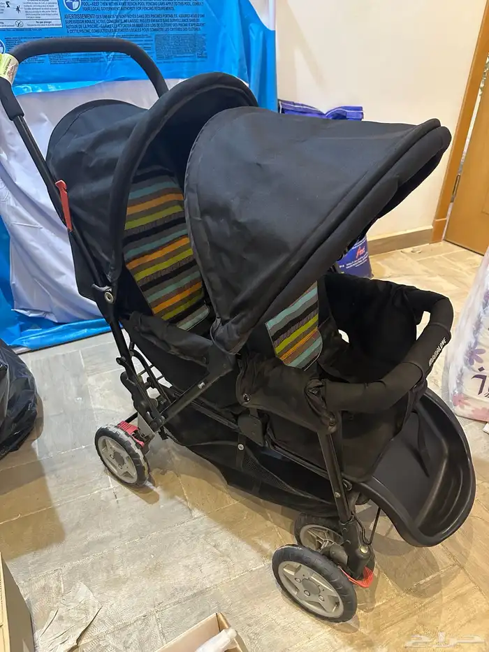 عربة أطفال لطفلين 1
