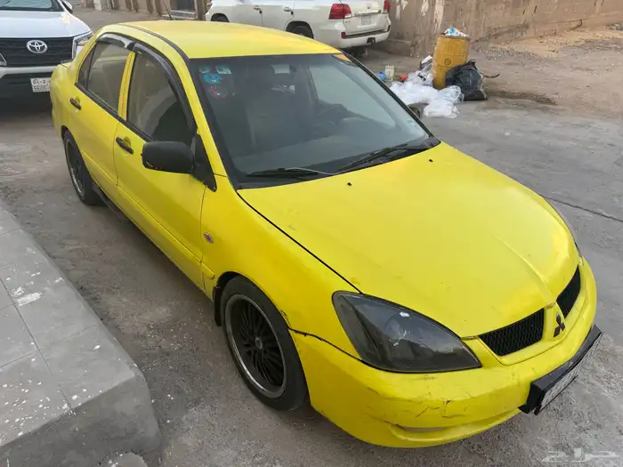 لانسر بومه 2009 2