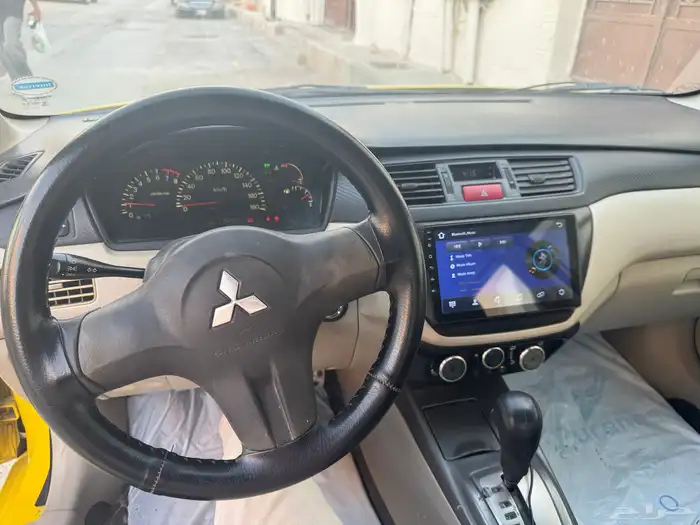 لانسر بومه 2009 8