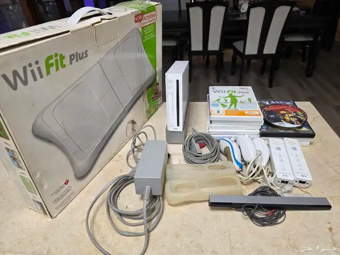 نينتدو ويي wii مع الفيت بورد ومجموعة ألعاب 0
