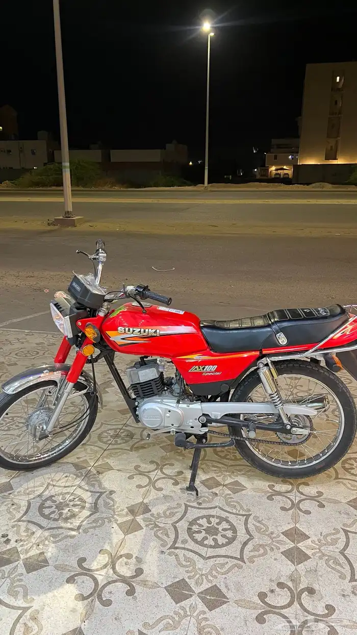 سوزوكي AX100 0