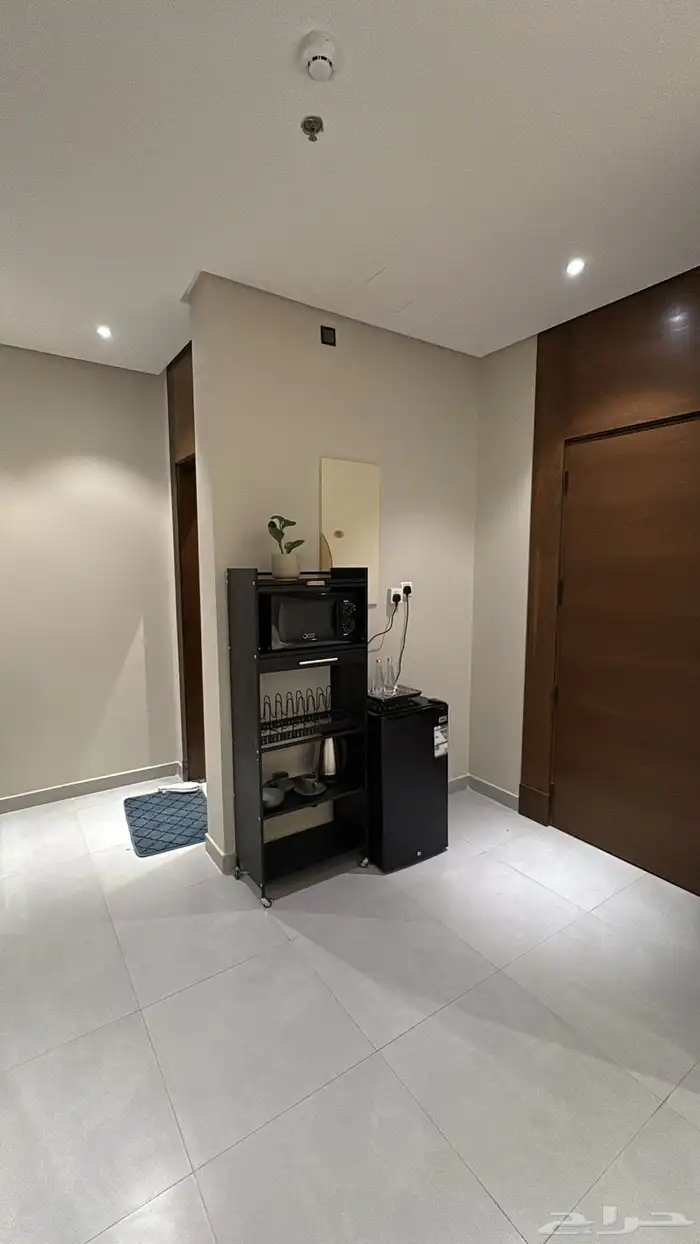 استديو سكنية بتصميم فندقية ف عمارة فاخرة 6