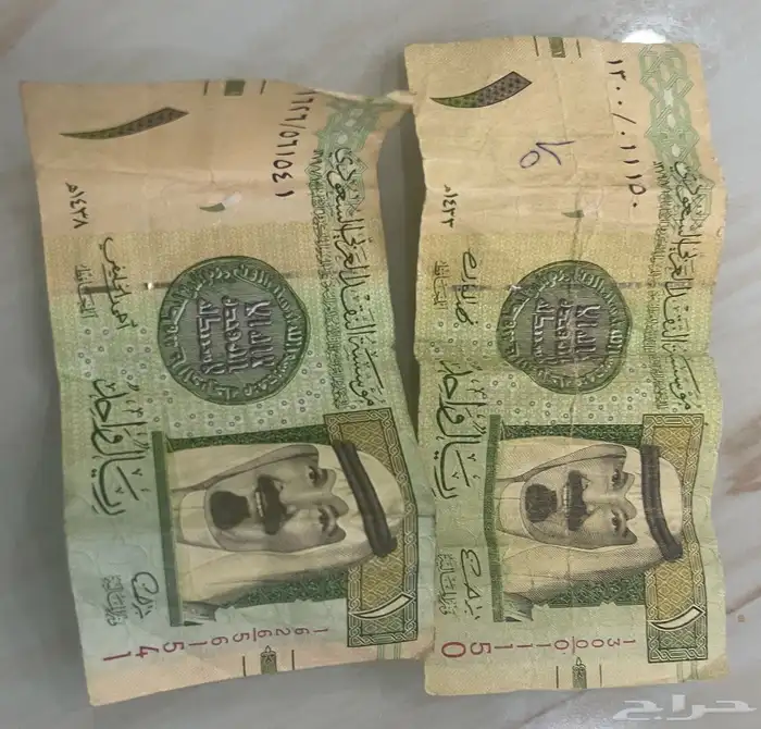 ريالين ورق توقيع أحمد خليفة والثاني توقيع فهد المبارك 0