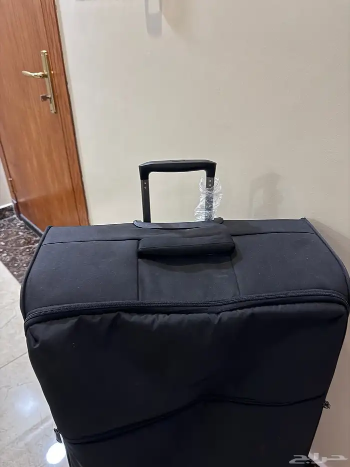 شنطة سفر كبيرة حالته جدا  ممتازة 2