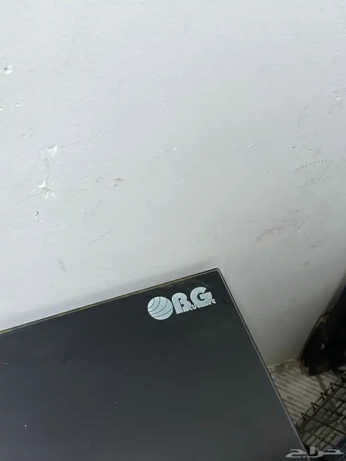 طاوله تلفزيون قزاز اسود نضيفه مع معلاق وموقد غاز 2