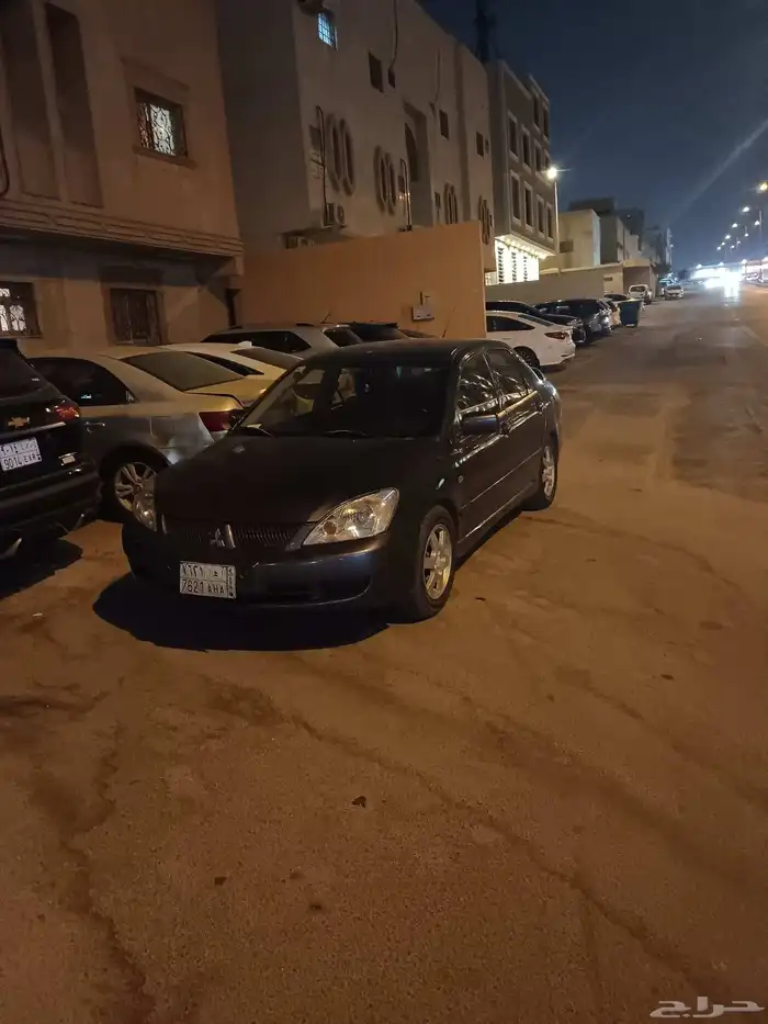 متسوبيشي لانسر بومة 2009 ممشى 377 الف بحالة ممتازة 1
