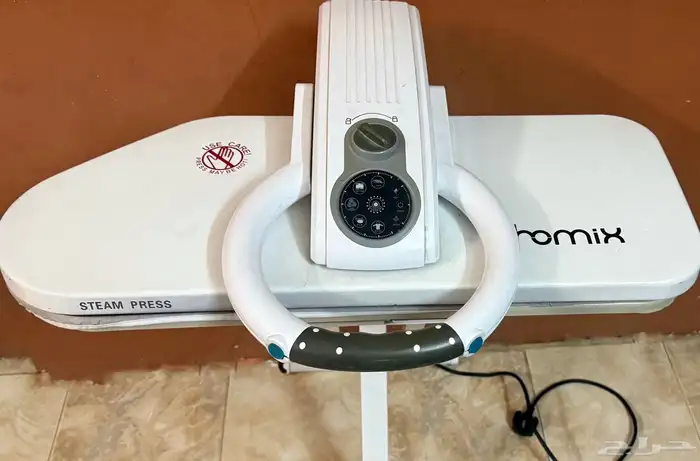 مكواة من شركة homix 1