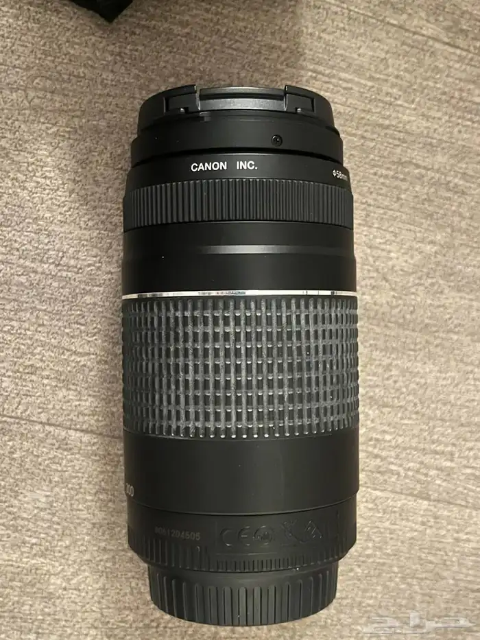 عدسة كمرا كانون تكبير. نظيفة استخدام بسيط تكبير 75-300mm 4