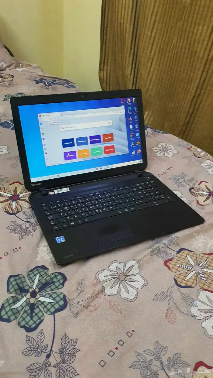 لاب توب توشيبا بمعالج سيليرون نظيف 7