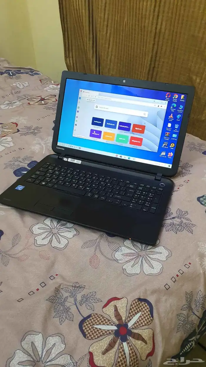 لاب توب توشيبا بمعالج سيليرون نظيف 5