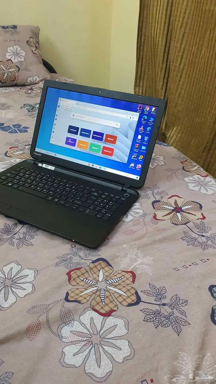 لاب توب توشيبا بمعالج سيليرون نظيف 4