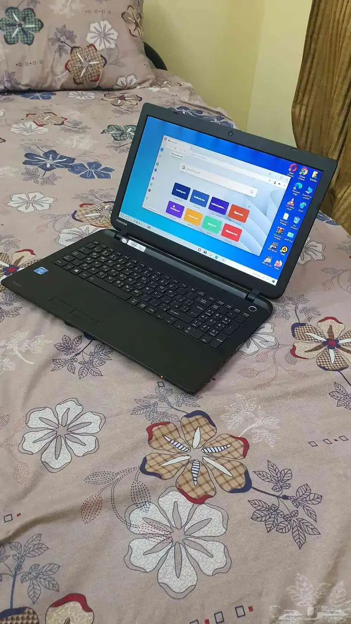 لاب توب توشيبا بمعالج سيليرون نظيف 6