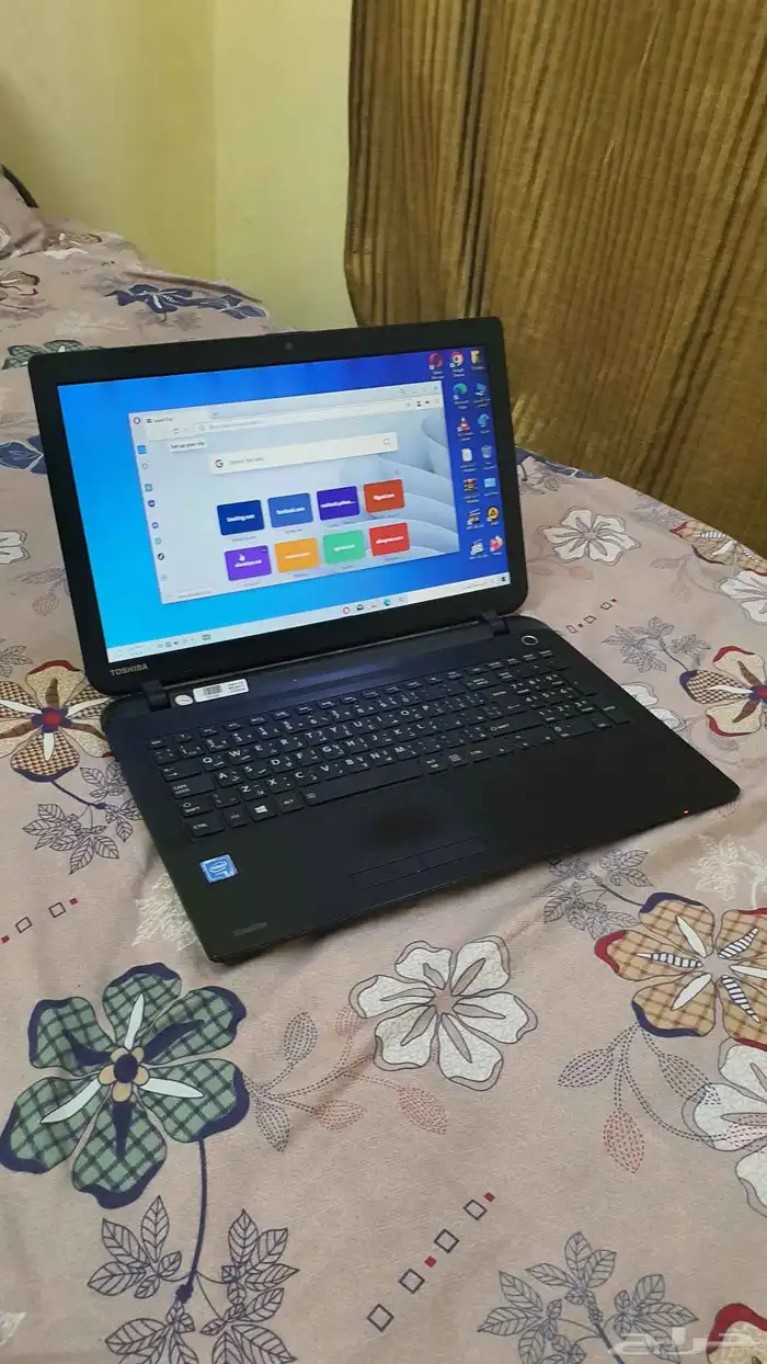 لاب توب توشيبا بمعالج سيليرون نظيف 8