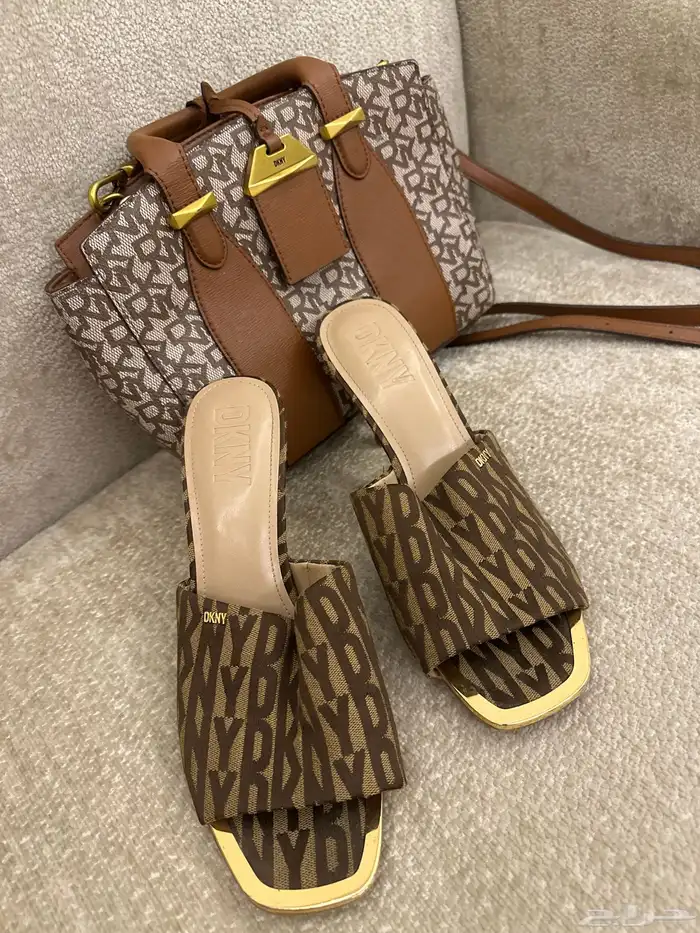 شنطة وكعب من ماركة ديكني ابيعها كلها مع بعض با الف وميتين 0