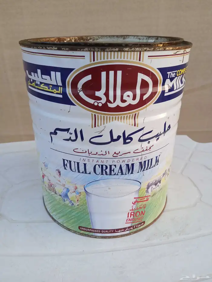 علبة حليب. العلالي 1996 9