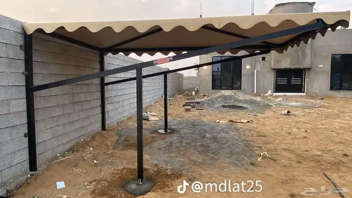 المظلات وسواتر جيزان تركيب مظلات مواقف للسيارات 1
