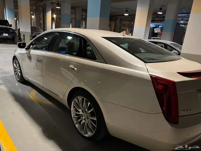 كادليك xts 2013 2