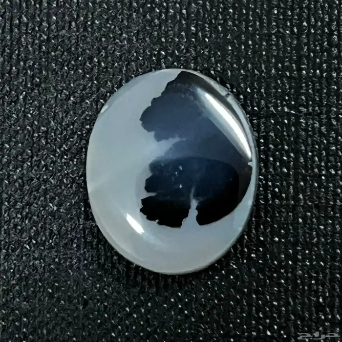 حجر عقيق مصور وجه حرمة بنقاب اسود 0