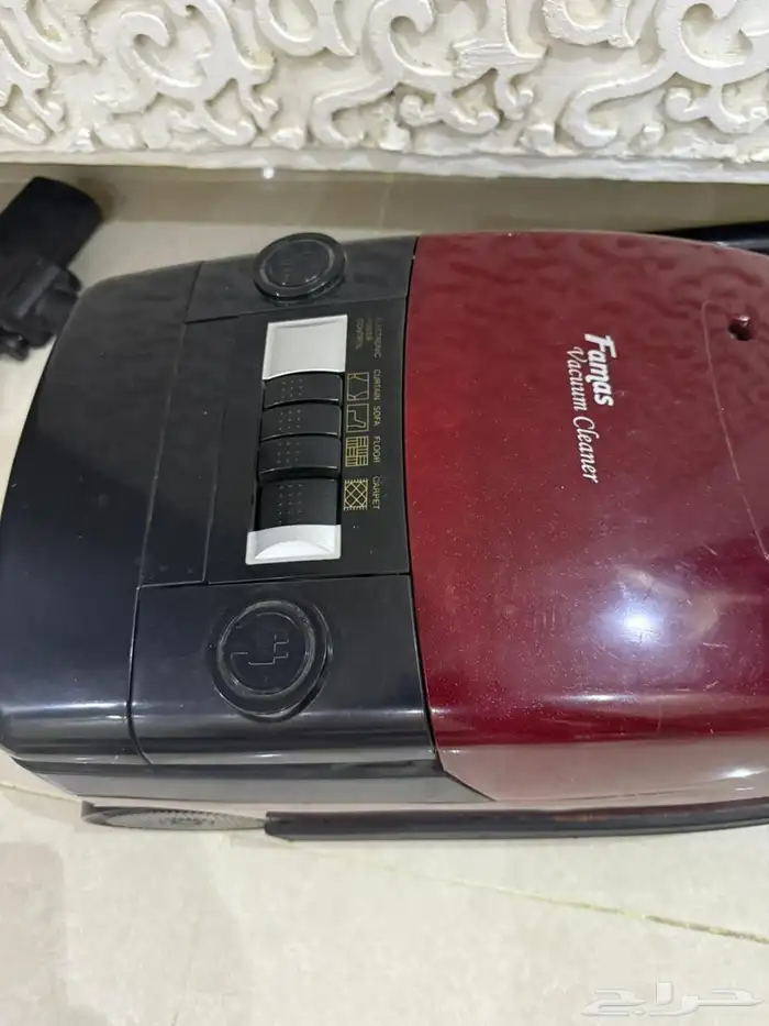 مكنسة كهرباء وصحون وكاسات 1