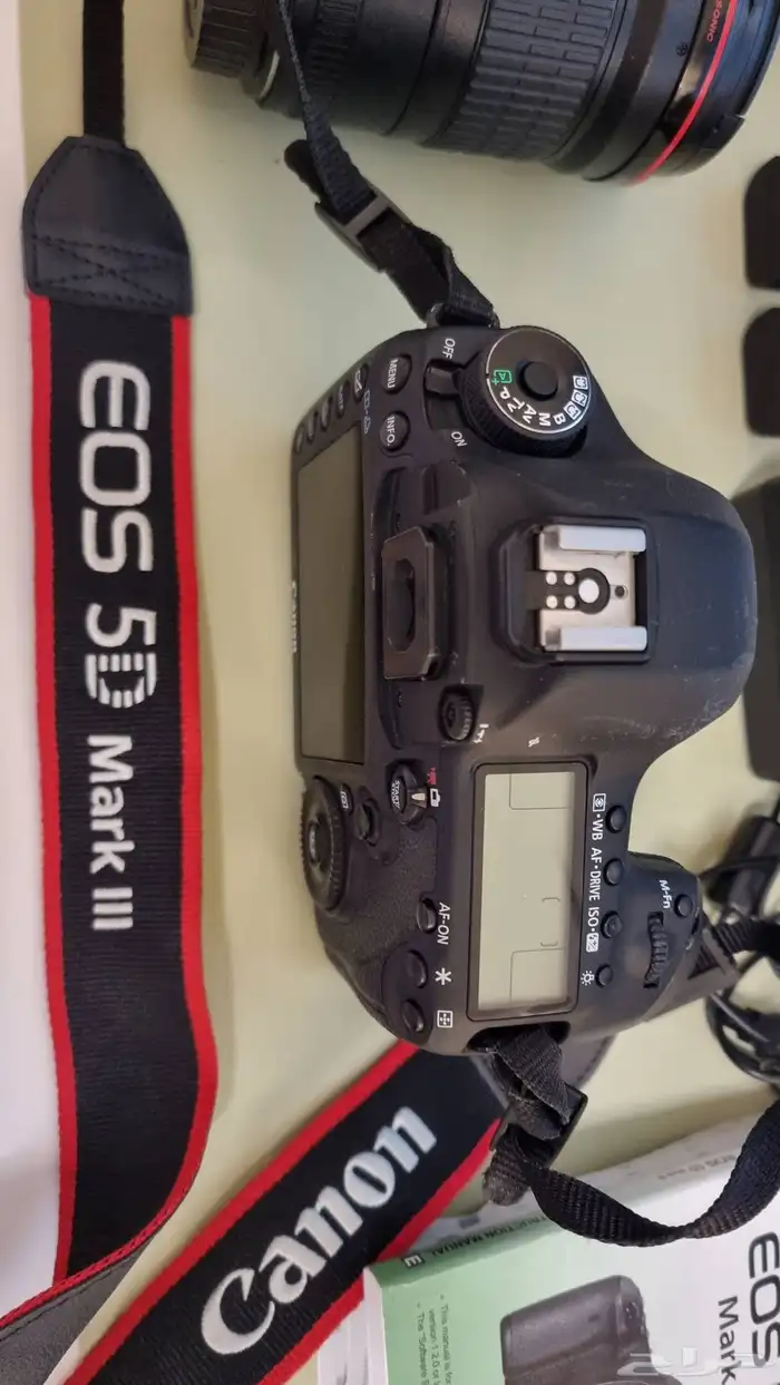 كاميرا كانون 5d mark iii مع عدسة 135mm 1 2 9