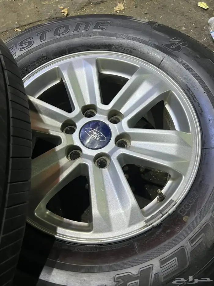 جنوط فورد اف 150 اصلي وكاله  مع كفرات برجستون 265.70.17 ت22 11