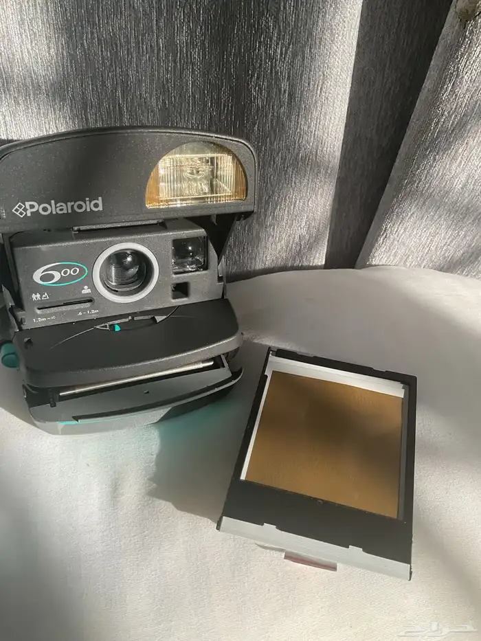 كاميرا. Polaroid الفورية. 3