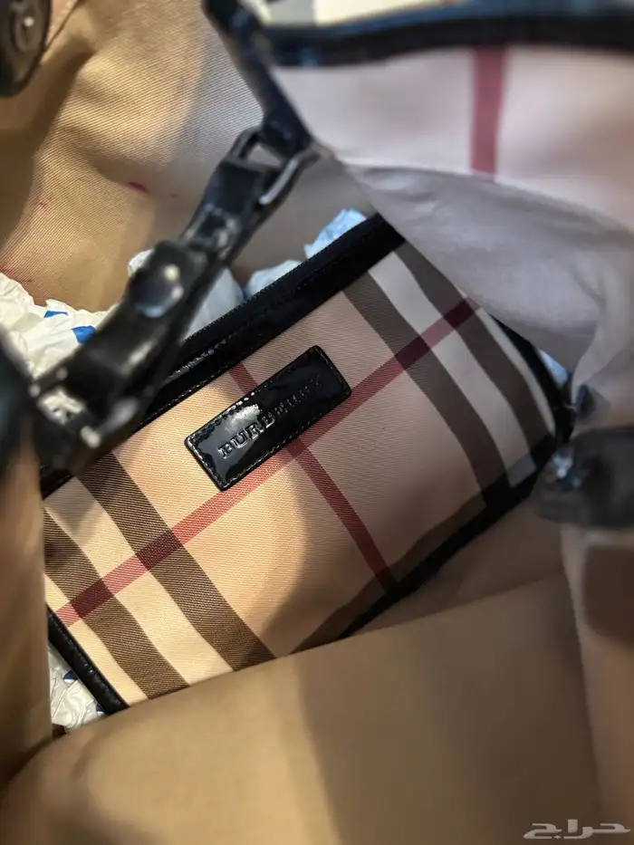 شنطة ماركة اصلية كوتش - بربري 8