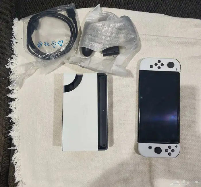 للبيع جهاز nintendo switch oled بحالة الجديد 0