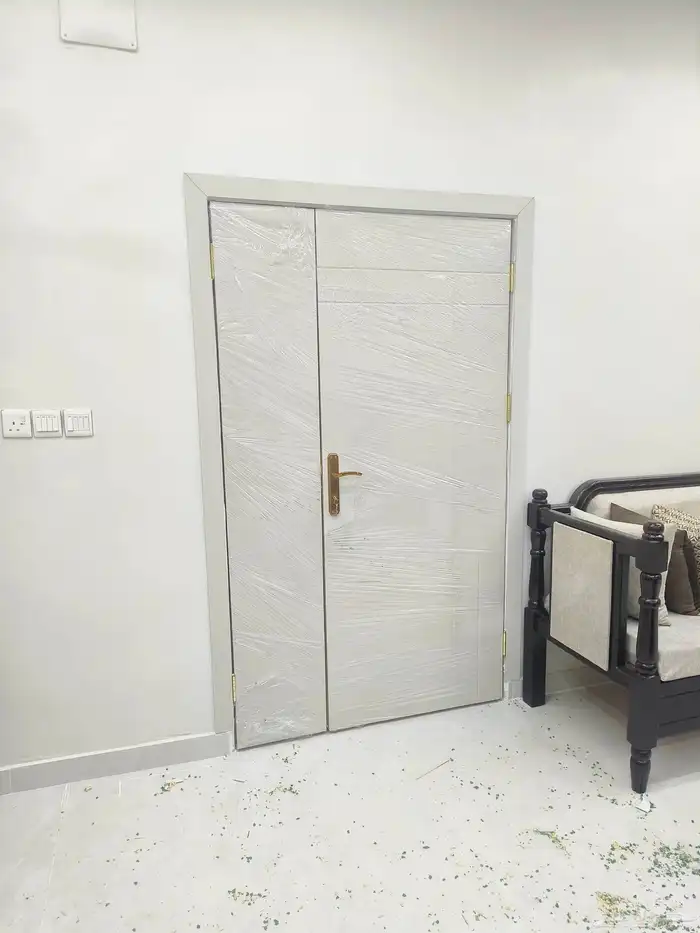 تفصيل ابواب خشب بجميع انواعها ودبليو بي سي 0