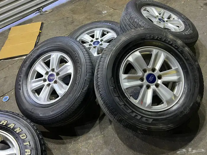 جنوط فورد اف 150 اصلي وكاله  مع كفرات برجستون 265.70.17 ت22 10