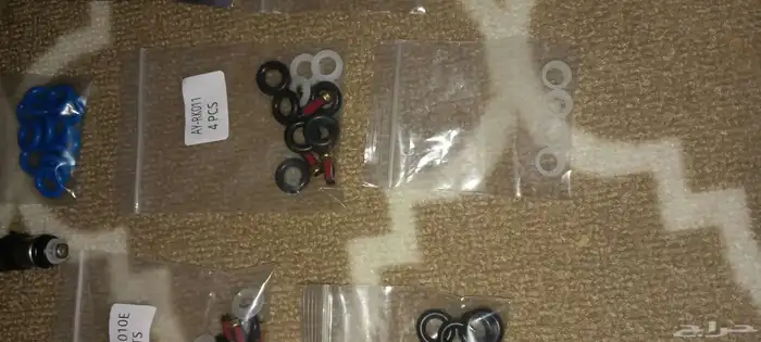 تركيب جلد وفلتر بخاخات فورد تاون كار من 99 لي 2002 2