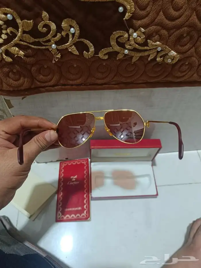 نطارات كارتير سانتس قصه صدام حسين 0