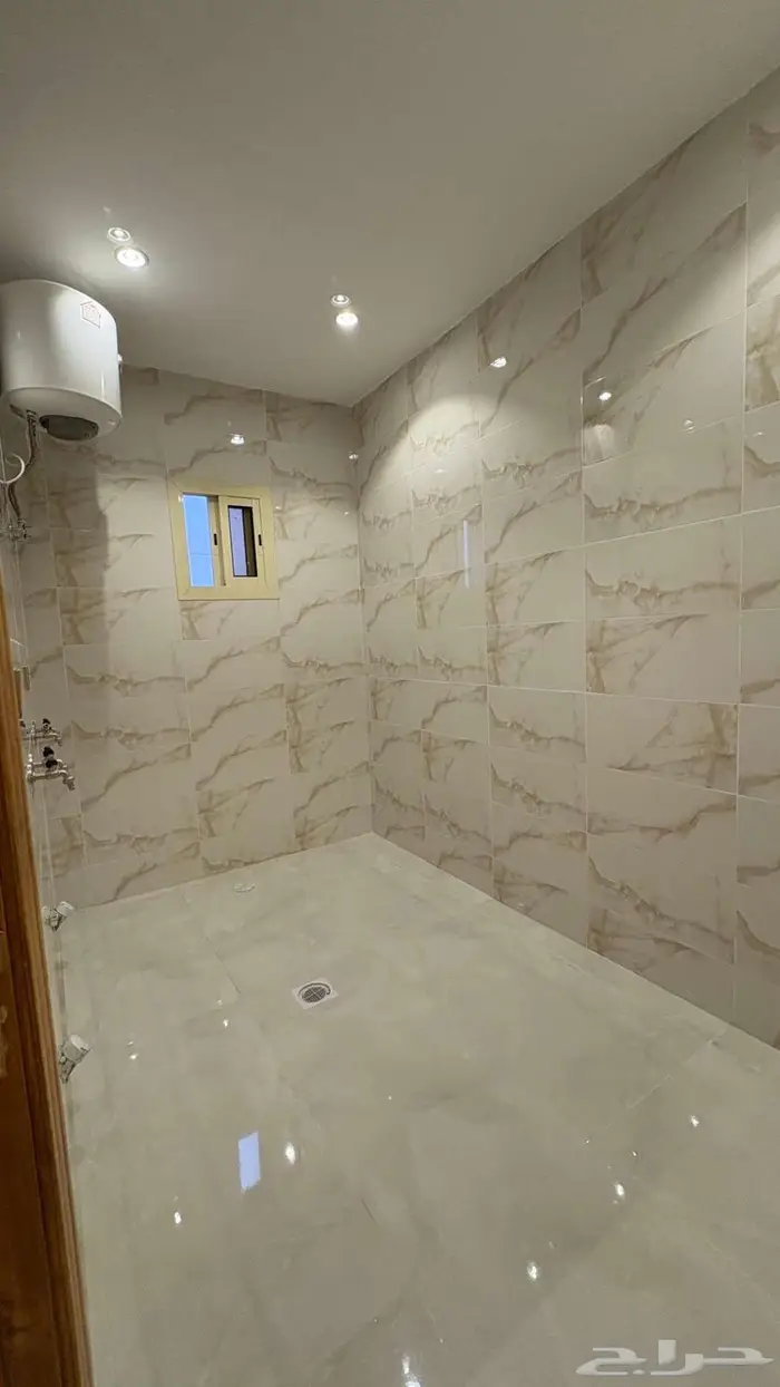 شقة دور ثاني للبيع حي اليرموك(سطح خاص مطبخ راكب مصعد راكب ) 15