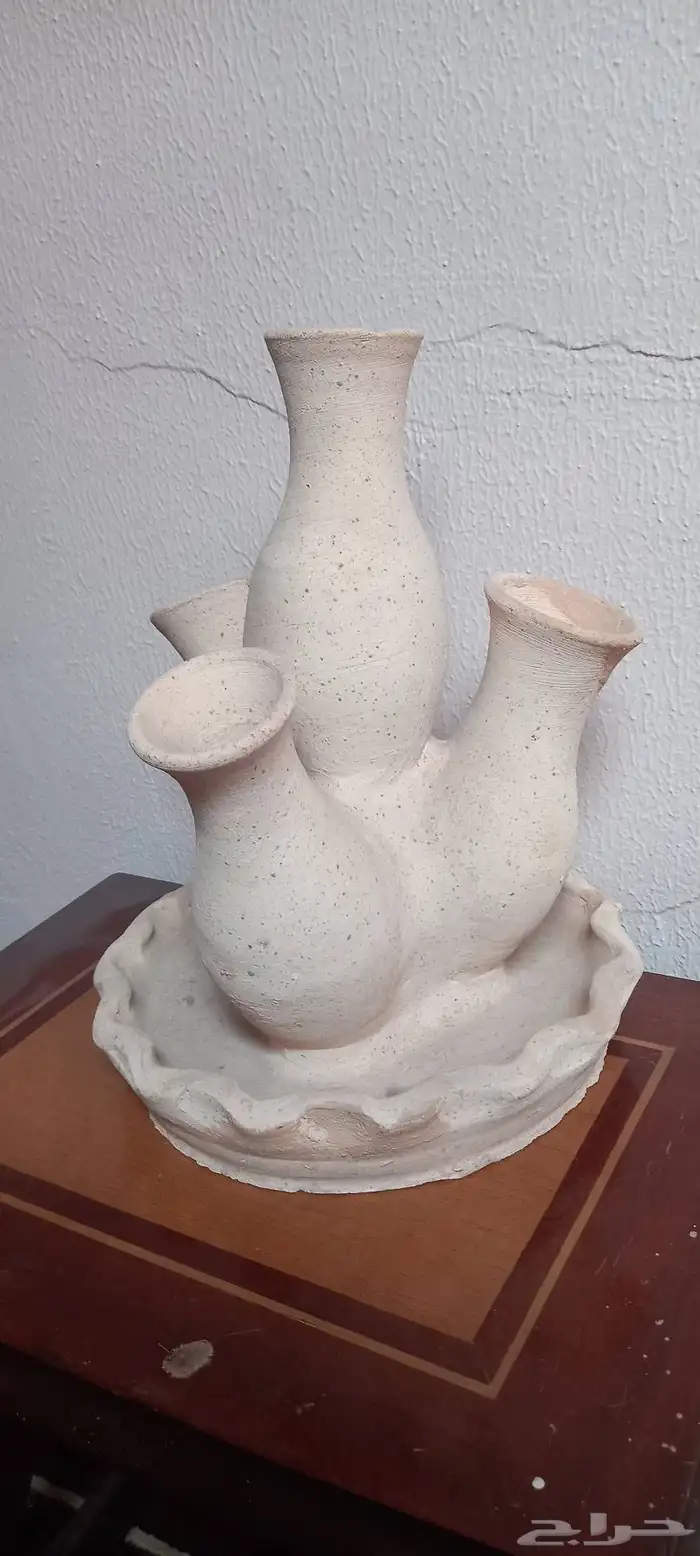 اربعة قروش . عمل فني ساعات جداريه 9