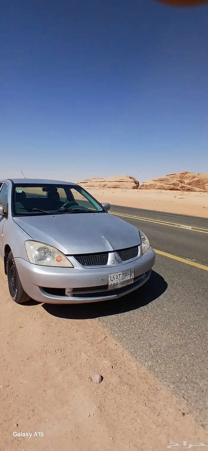 متسوبيشي لانسر (بومه) موديل 2009 للبيع 6