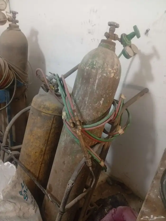 اسطوانتين اوكسجين واستيلين مع المنظمين واللي واليد والعربية 0